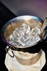 Image showing Close up ice in metal bucket