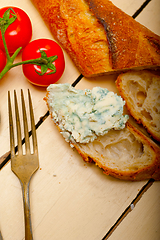 Image showing fresh blue cheese spread ove french baguette