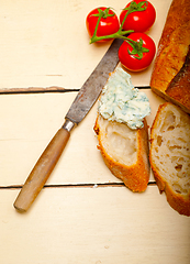 Image showing fresh blue cheese spread ove french baguette