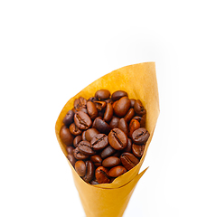 Image showing espresso coffee beans on a paper cone