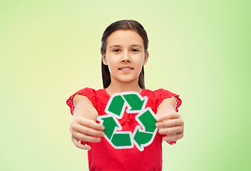 Image showing smiling girl holding green recycling sign