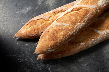 Image showing close up of baguette bread on table