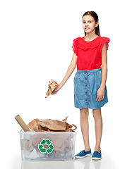 Image showing smiling girl sorting paper waste