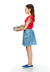 Image showing smiling girl with magazines sorting paper waste