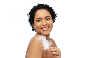 Image showing happy african american woman with feather