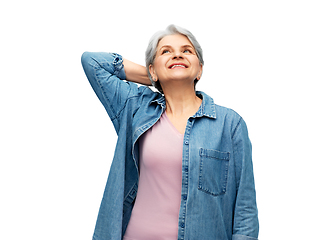 Image showing portrait of smiling senior woman in denim shirt