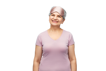 Image showing senior woman in pajamas and eye sleeping mask