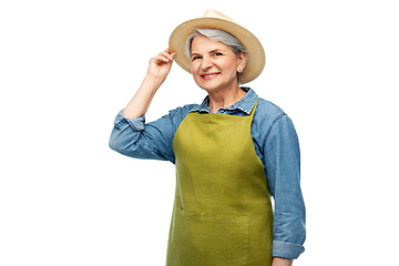 Image showing portrait of smiling senior woman in garden apron