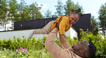 Image showing happy african american father with baby daughter