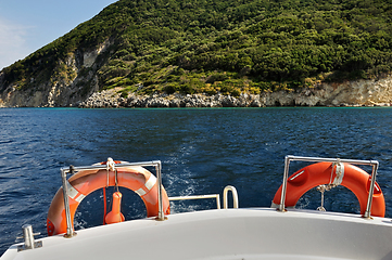 Image showing boat stern with life buoys