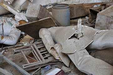 Image showing broken statues in vandalized interior