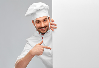 Image showing happy smiling male chef with big white board