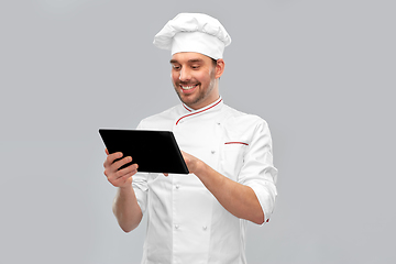 Image showing happy smiling male chef with tablet pc computer