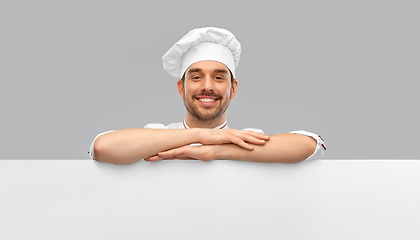 Image showing happy smiling male chef with big white board