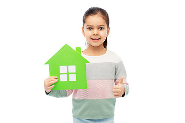 Image showing smiling little girl holding green house icon