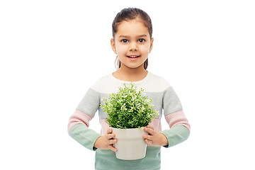 Image showing happy smiling girl holding flower in pot