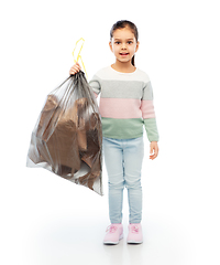 Image showing smiling girl with paper garbage in plastic bag