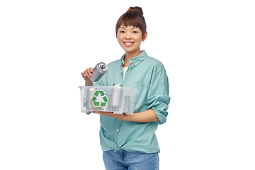 Image showing smiling young asian woman sorting metallic waste