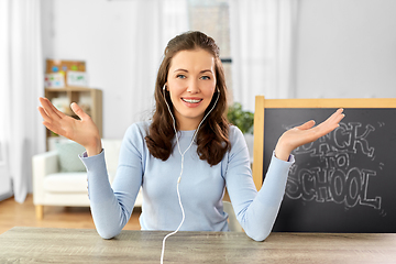 Image showing teacher having online class or video call at home