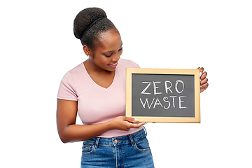 Image showing happy woman holds chalkboard with zero waste words