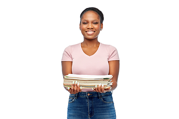 Image showing smiling african american woman sorting paper waste