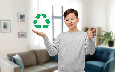 Image showing boy with green recycling sign showing thumbs up