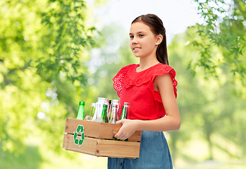 Image showing smiling girl with wooden box sorting glass waste