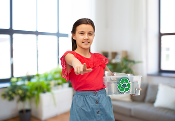 Image showing smiling girl sorting metallic waste at home