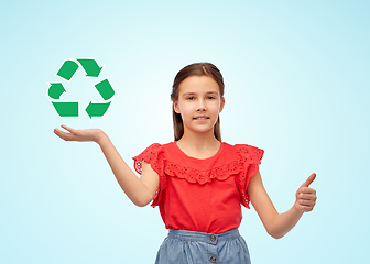 Image showing girl showing thumbs up and holding recycling sign