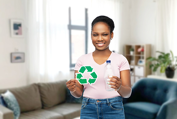 Image showing woman with recycling sign and plastic bottle