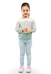 Image showing smiling girl with toy wind turbine