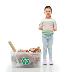 Image showing girl sorting paper waste and showing thumbs up