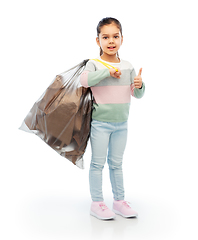 Image showing smiling girl with paper garbage in plastic bag