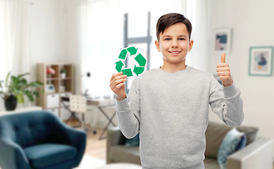 Image showing boy with green recycling sign showing thumbs up