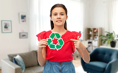 Image showing smiling girl showing green recycling sign