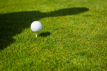 Image showing Close up of golf ball on tee with copy space