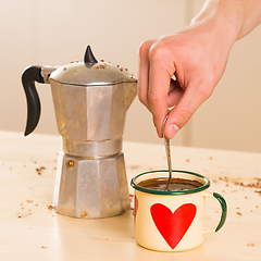 Image showing Coffee in Italian style on a wooden table