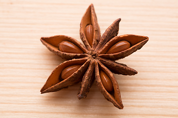 Image showing Organic star anise on a wooden table