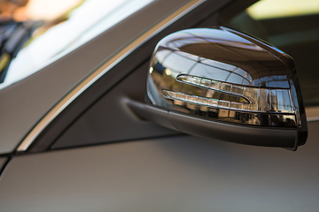 Image showing Closeup photo of grey car. 