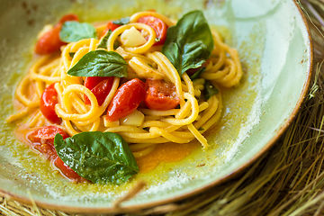 Image showing Homemade pasta with Basil and tomatoes