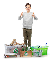 Image showing smiling boy sorting paper, metal and plastic waste