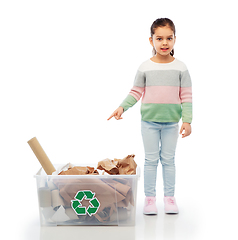 Image showing smiling girl sorting paper waste