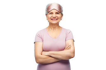 Image showing senior woman in pajamas and eye sleeping mask