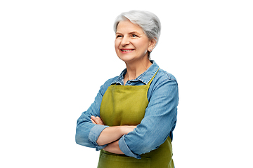 Image showing portrait of smiling senior woman in garden apron