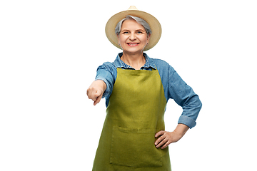 Image showing portrait of smiling senior woman in garden apron