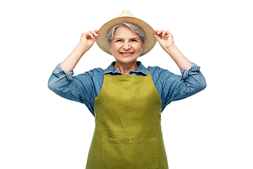 Image showing portrait of smiling senior woman in garden apron