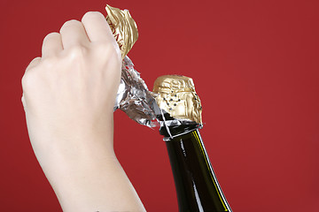 Image showing Opening champagne bottle