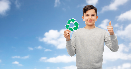 Image showing boy with green recycling sign showing thumbs up