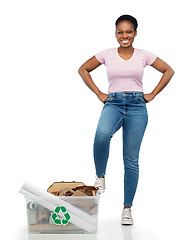 Image showing happy african american woman sorting paper waste