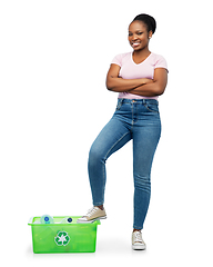 Image showing smiling young asian woman sorting plastic waste